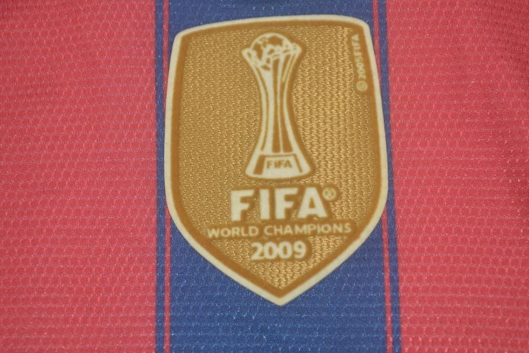 אלופת העולם - חליפת עבר ילדים ברצלונה בית 09/10